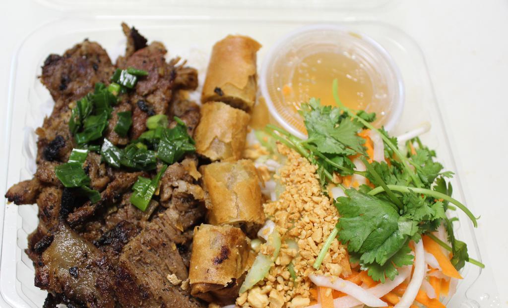 (61) Grilled Pork Vermicelli (Bun Thit Nuong Cha Gio) · 61. juicy Grilled pork on a bed of Vermicelli noodle, eggroll, pickled veggies, and a side of fish sauce!
Bun Thit Nuong Cha Gio