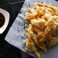 Ojingeo Twigim · Korean style fried squid with house dipping sauce.