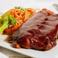 BBQ Baby Back Ribs (1 lb) · One pound bbq ribs served with your choice of garlic mashed potato or spaghetti fresh veggie...