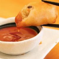 L3. Vegetarian Spring Rolls · Crispy spring roll with celery, carrots, napa cabbage, and bamboo shoots.