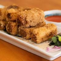 R1. Five-Spice Crispy Silken Tofu · Crispy silken tofu with salt and pepper, served with chili lime ginger sauce.