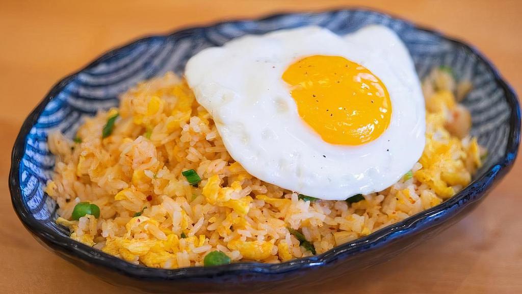 F2. Kimchi Fried Rice · House-made kimchi stir-fried with rice and green onion, topped with a fried egg.