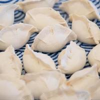 DJ3. [Frozen] Korean BBQ Beef Dumplings (20 pcs) · Korean bulgogi flavored beef dumplings. Uncooked frozen dumplings.