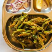Nethli Meen Fry · Fresh Anchovies fry in a marinated organic greens and spices