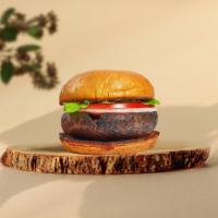 The Falafel Burger (Regular) · Crispy vegan falafel patty with lettuce, red onion, tomatoes, tahini and baba ganoush.