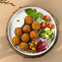 Crispy Falafel · Six pieces of crispy garbanzo beans marinated in homemade spices.