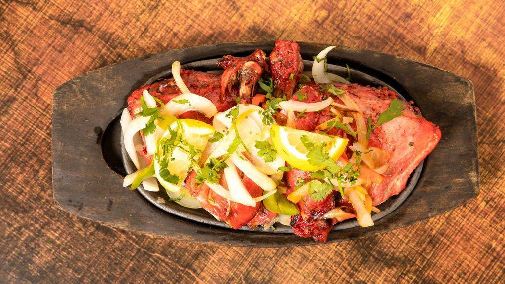 Tandoori Chicken -8 Pieces · Country style (country chicken) chicken fully cooked in Tandoor with overnight marinated process.