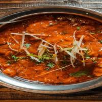 Fish Tikka Masala · House specialty: fish marinated special yogurt sauce, baked in clay oven and simmered in a s...