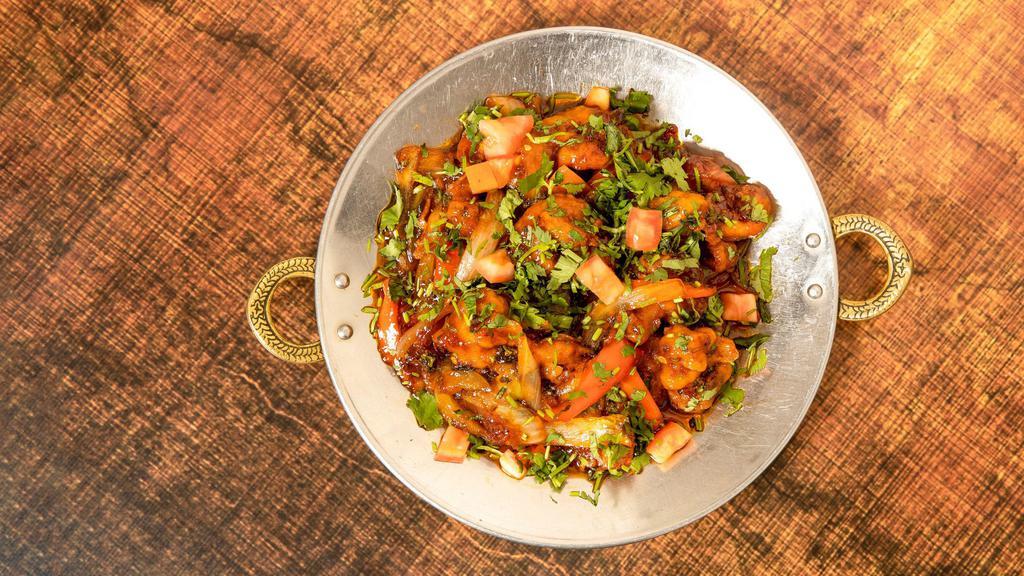 Gobhi Manchurian · House specialty: batter fried cauliflower in sweet chili sauce.