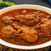 Chicken Vindaloo · Chicken and potatoes cooked in a special vindaloo sauce.