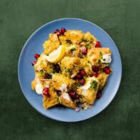 Aloo Papdi Chaat   · Classic stuffed patty and mixed with hot, sweet and tangy sauces, yogurt and topped with fre...