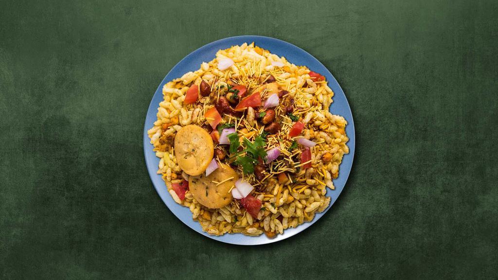 Masala Puffed Rice · Loaded bhel made with puffed rice, finely chopped veggies and chaat relish.