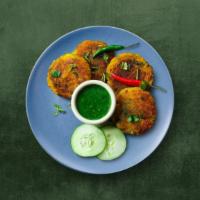 Potato Cutlet · A delicious snack made with boiled potatoes, aromatic spices, herbs and fried till golden an...