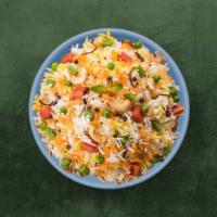 Veggie Biryani · Aromatic basmati rice cooked with vegetables and fresh herbs, spices and cooked in a special...