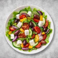 Gusto Greek Salad · Classic greek salad with fresh romaine lettuce, feta cheese, cucumber, tomatoes and olives.