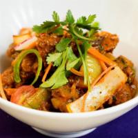Chicken Jalfrezi · Chicken cooked with bell pepper onion and spices.