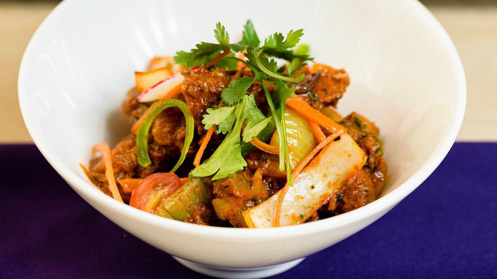 Chicken Jalfrezi · Chicken cooked with bell pepper onion and spices.