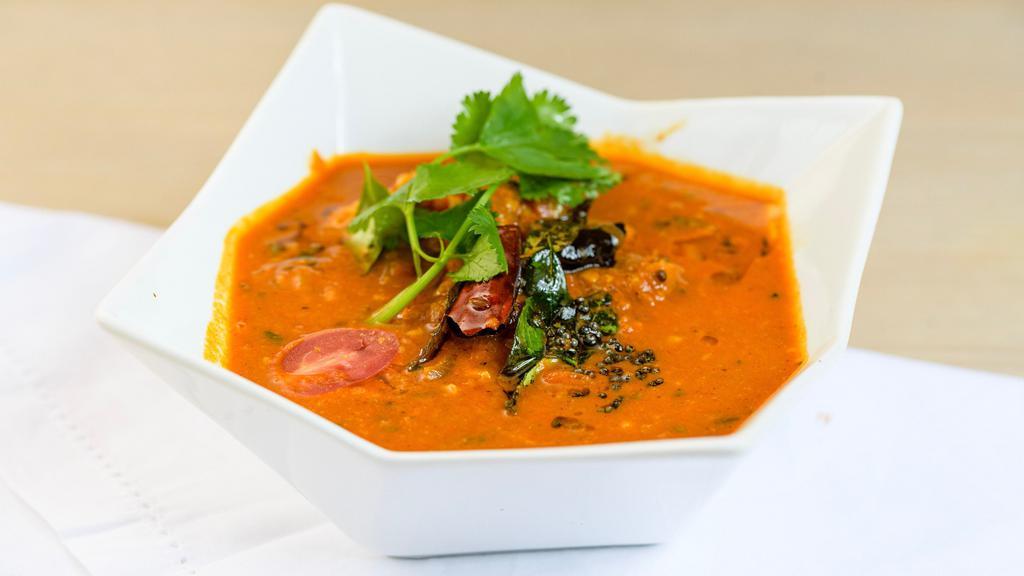 Fish Masala · Fish cooked in mild spicy sauce.