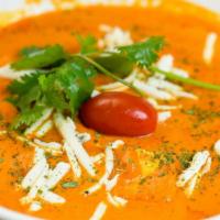Paneer Makhani · Homemade cheese pieces cooked in tomato and cream sauce.