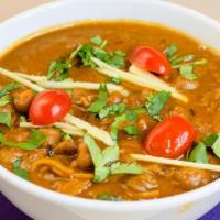 Channa Masala · Garbanzo beans cooked in a blend of spices.