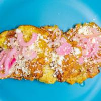 Tostones · Deep fried plantains topped with pickled shallots and queso fresco.
GS, Vegetarian