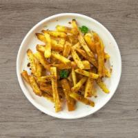 Garlic Fries · (Vegetarian) Idaho potato fries cooked until golden brown and garnished with salt and garlic.