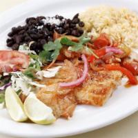 Pescado A La Veracruzana · Fillet of red snapper sauteed with onions tomatoes, bell peppers, wine & sauce -served with ...