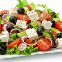 Greek Salad · A zesty salad of feta cheese, black olives, tomatoes, lettuce, cucumber, mint and radish dre...