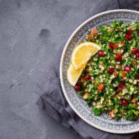 Tabbouleh · A salad of cracked wheat, parsley, tomatoes, onions, lemon juice and olive oil.