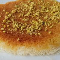 Kanafeh · Delicious sweet arabic cheese wrapped in filo dough with syrup and crushed pistachio nuts.