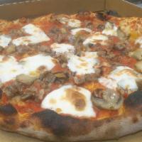 Pizza Funghi E Salsiccia · Mushrooms, mozzarella, tomatoes sauce, and sausage.