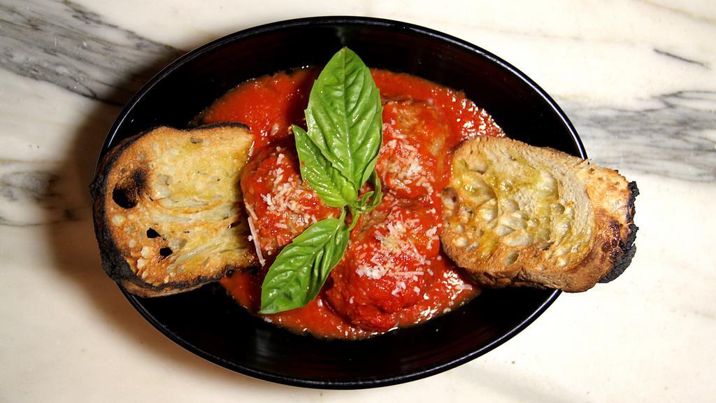 Polpette al sugo · Housemade meatballs with san marzano tomato sauce.