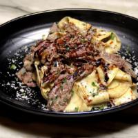SPECIAL!! Pappardelle Black truffle & Sausage · Housemade Pappardelle served with black truffle cream sauce, mushrooms and Italian sausage.