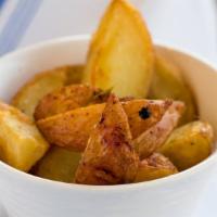 Patate al Forno · Roasted yukon potatoes.