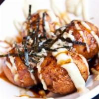 Takoyaki (4 Pieces) · Battered octopus balls with special creamy sauce.