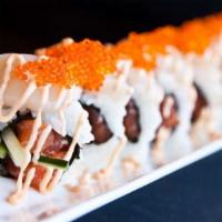 Romeo & Juliet Roll · Salmon, avocado topped scallop and tobiko with spicy mayo.