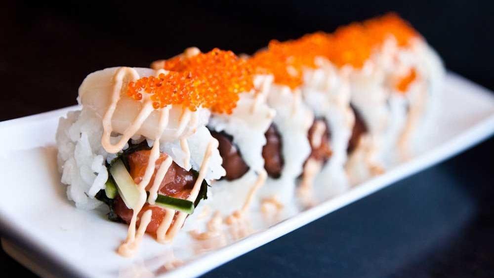Romeo & Juliet Roll · Salmon, avocado topped scallop and tobiko with spicy mayo.