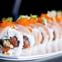 Godzilla Roll · Tempura, asparagus and spicy tuna topped with albacore and tobiko with green onion and ponzu.