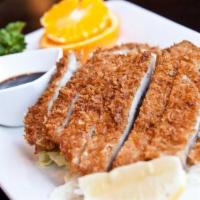 Ton Katsu · Deep fried pork cutlet served with soup, salad and rice.