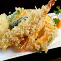 Shrimp Tempura · With vegetables and served with soup, salad and rice.