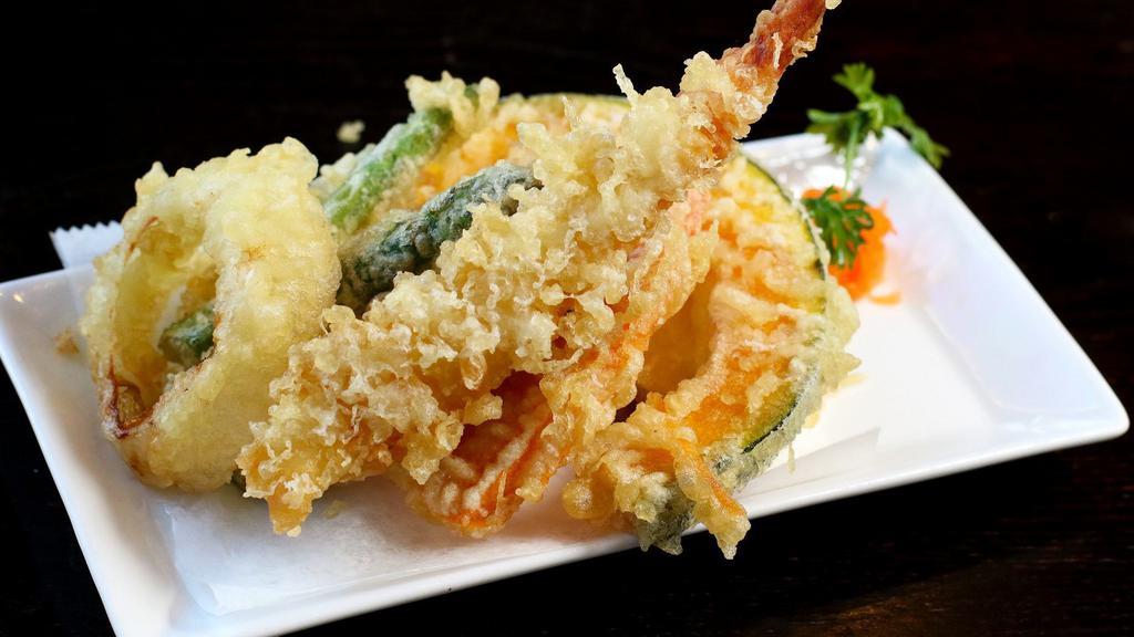 Shrimp Tempura · With vegetables and served with soup, salad and rice.