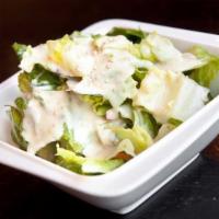 Green Salad · Mixed green salad with sesame dressing.