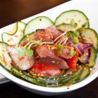 Tuna Poke · Seaweed salad, onion and cucumber with spices in vinegar dressing.