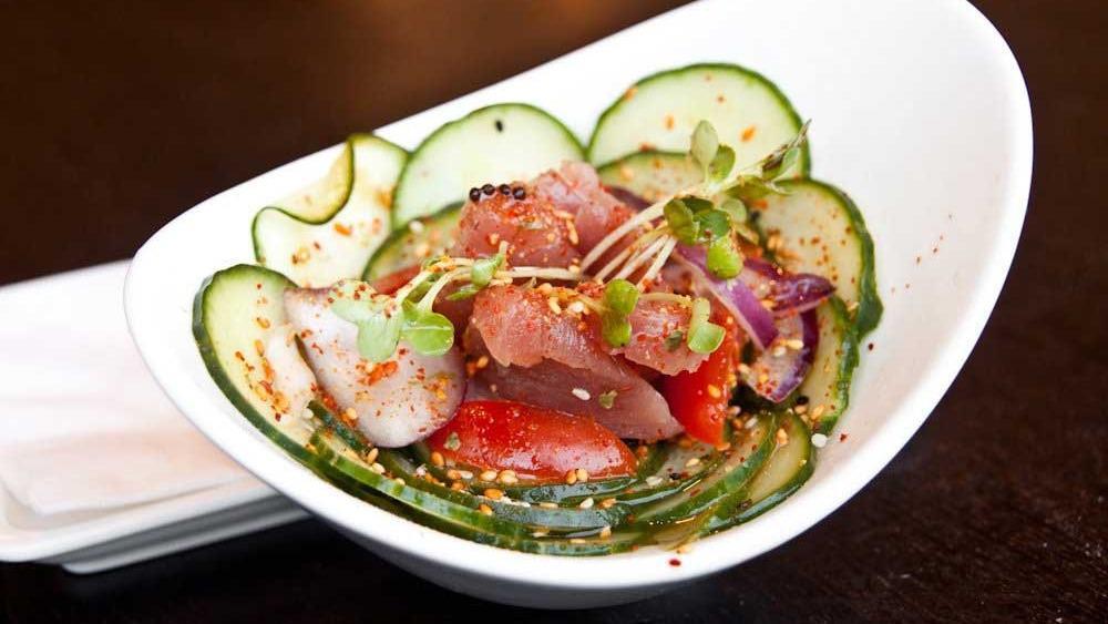 Tuna Poke · Seaweed salad, onion and cucumber with spices in vinegar dressing.