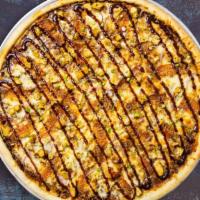 BBQ Bottega Pizza · Barbecue sauce, mozzarella cheese, ham, pineapple, red onions, chicken breast marinated in b...