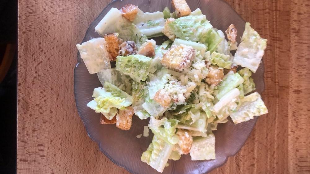 Caesar Salad · Organic romaine lettuce with caesar dressing, croûtons, and Parmesan cheese.