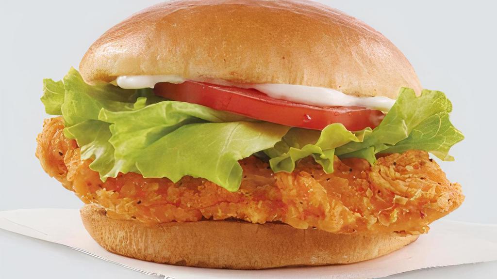 Spicy Chicken Sandwich · Four ounces of deep-fried chicken breast stacked with our spicy house sauce, lettuce, and tomato.