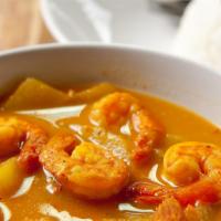 Shrimp Curry · Shrimp cooked fresh with homemade curry sauce and our special spices. Served with your choic...