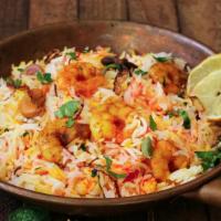 Shrimp Biryani · Fresh shrimp cooked with basmati rice and a special biryani masala. Comes with delicious rai...