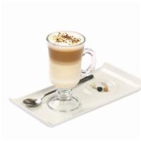 Caffè Latte · Freshly pulled espresso shot mixed with steamed milk and a light layer of foam. Add a flavou...